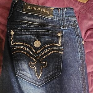 Rock Revival Women's Dark Blue Jeans with Embellished Pockets